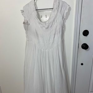 White off the shoulder dress.